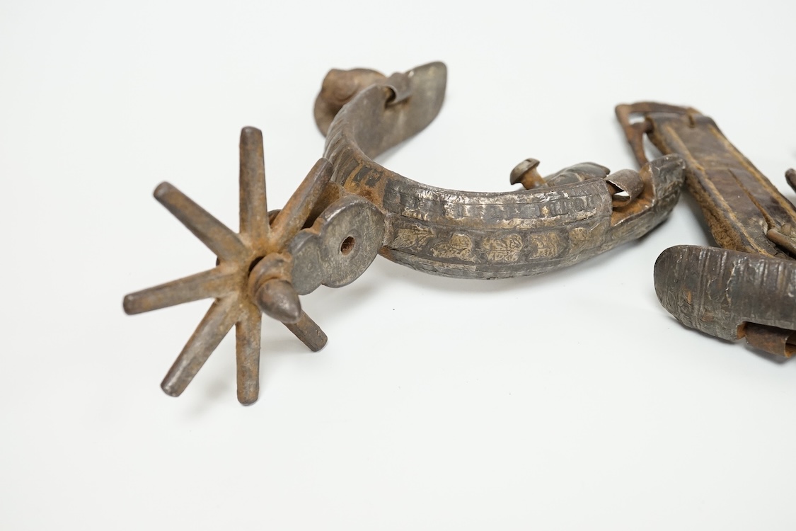 Three Spanish Colonial niello work and iron spurs, 14cm long